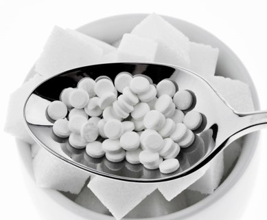 Low calorie sweetener and sugar cubes. Symbol for calories and diet, Austria