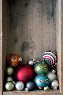 Christmas decoration glass balls in a wooden box background