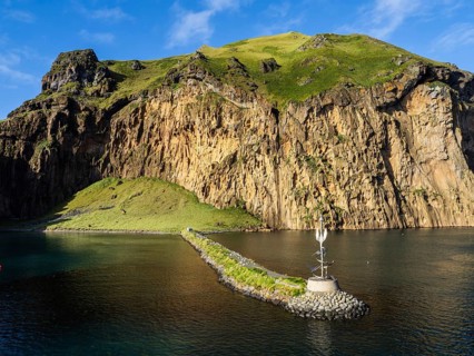 Breakwater in front of the harbour entrance, Heimaey, Westman Islands, Suðurland or South Iceland,
