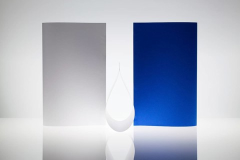 Symmetry abstract - Paper Background on a glass table
