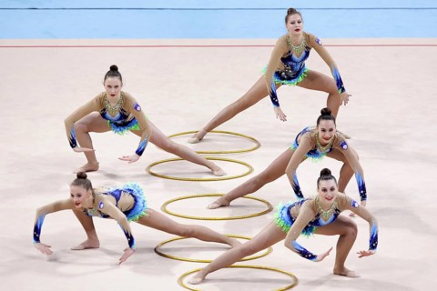 Sofia, Bulgaria - 30 March, 2018: Team Slovenia performs with hoops during Rhythmic Gymnastics