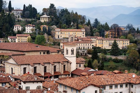 Red tiled roofs of old houses. Bergamo, Italy.