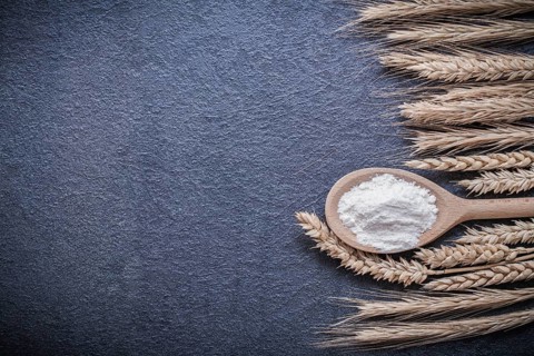 Wooden spoon flour wheat rye ears horizontal version