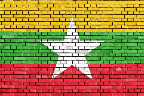 Flag of Myanmar painted on brick wall