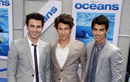 Nick Jonas, Kevin Jonas and Joe Jonas of The Jonas Brothers at the Los Angeles premiere of 'Oceans'