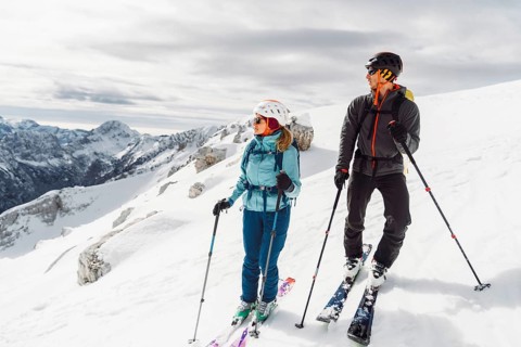 Mountaineer backcountry ski touring in the mountains. Ski touring in high alpine landscape with