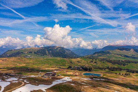 Panoramic view from the Seiser Alm to the Dolomites in Italy, drone shot