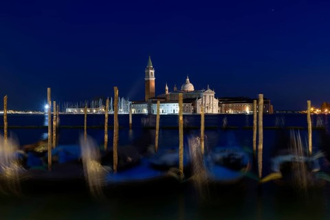 Church of San Giorgio Maggiore with gondolas at night, Venice, Italy