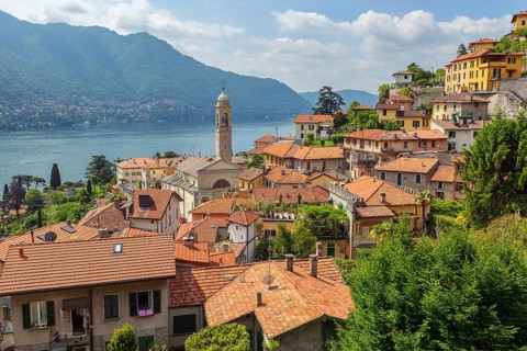 Old church in town at the coast of Como lake, Italy