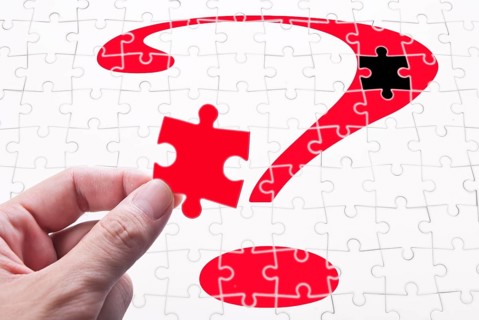 Question mark, human hand and puzzle game. concept of solve problem