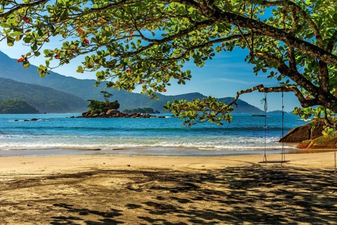 Wild beach of Castelhanos and its paradisiacal tropical landscape on the island of Ilhabela in Sao