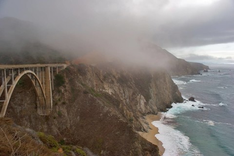 Road along Pacific coast USA and the bridge above a precipice