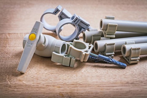 Water Valve Polypropylene Fixators And Pipe With Clips On Wooden Board