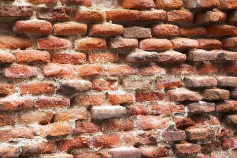 Not restored wall of an old bricklaying