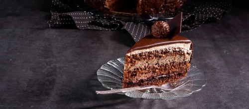 Chocolate cake Airy biscuits and a cream of cream and chocolate
