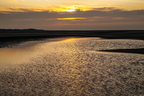 Sunset over the North beach of Borkum with beautiful light