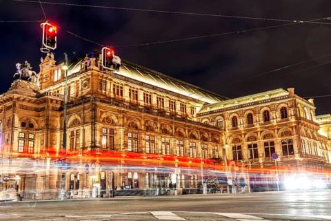 Vienna State Opera, light traces of a tram, night shot, Vienna, Austria