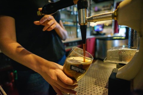 Drinking black beer, the Akahista bar, -Tin Pub -, Ahakista, Sheep's Head Peninsula, County Cork,