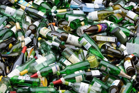 Removal of green used glass bottles in Cologne Ehrenfeld