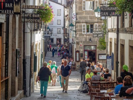Tourists and locals stroll and dine on Raina Street (Rua da Raina), Santiago de Compostela,