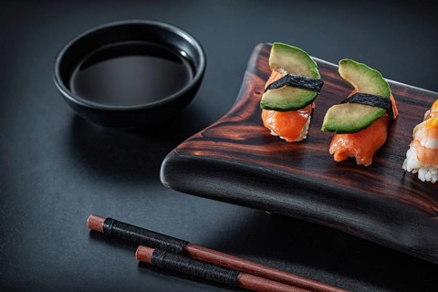 Sushi Ama Ebi Nigiri On Wooden Board With Soy And Chopstick