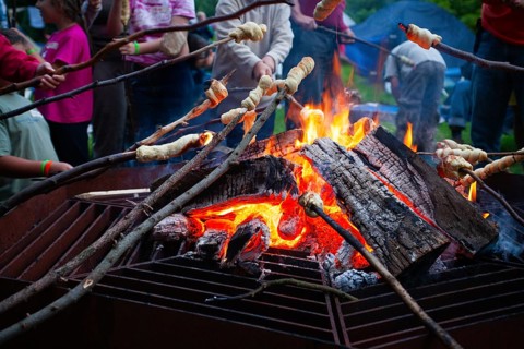 Stick bread over a campfire