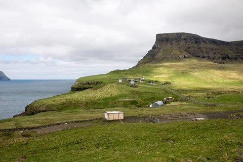 Gasadalur on the Faroe Islands as seen from the street leading towards the village on Vagar,