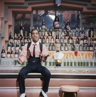 Sammy Davis Jr. 1925-1990. American singer, musician, dancer, actor. Pictured here when recording a