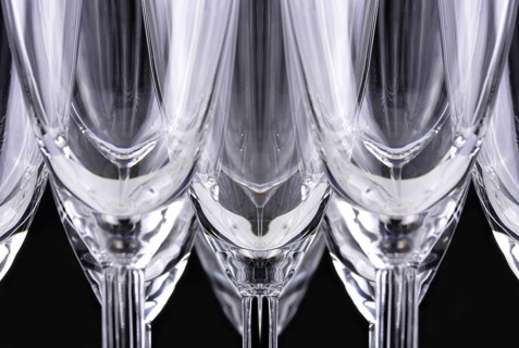 Champagne glasses in a black background
