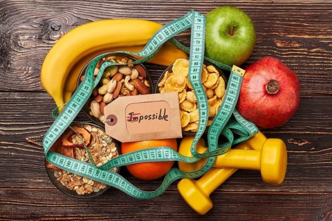 Fruits, cereals and sport equiment. Success comes to persevering