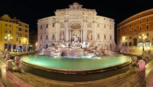 Panorama of Trevi Fountain without visitors at night. At 2:30 pm they closed the fountain for