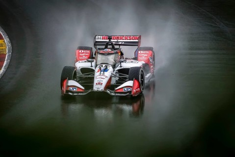 GRAHAM RAHAL (15) of New Albany, Ohio comes through turn 12 (Canada Corner) during a wet practice