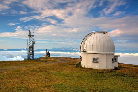 Observatory dome in the Gerlitzen Apls in Austria.View of the mountains in Slovenia