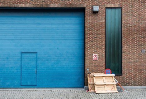 Jette, Brussels Capital Region, Belgium, 12 20 2019 Ugly blue Industrial garage port