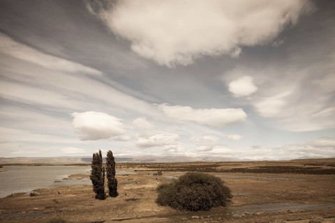 Argentine Patagonia on a windy day. Yellow flat desert with shallow lakes