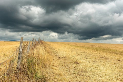 Countryside landscape under threatening sky. Aubrac France