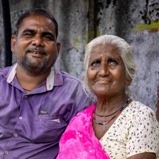 Portrait of an elderly woman with his son, Ahmedabad, Gujarat, India