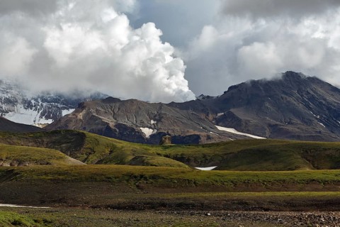 Beautiful volcanic landscape of Kamchatka Peninsula: picturesque view of active Mutnovsky Volcano,
