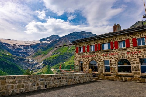 Terrace and Restaurant View over Beautiful Mountain Alp Grüm with Glacier and Alpine Lake Palü in a