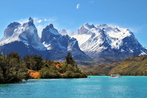 National Park Torres del Paine, Chile. Azure Lake Pehoe at the foot of the magnificent snow-covered