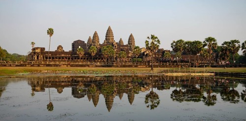 Panoramic scenery of angkor wat complex reflected on lake in the morning. Siem reap Campodia Asia