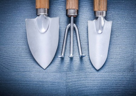 Two little garden spades and fork