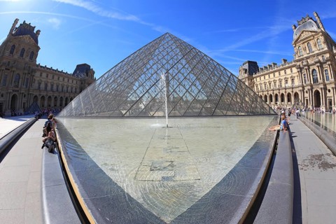 Paris, September 8: The world-famous entrance to the Louvre - the glass pyramid and a spectacular