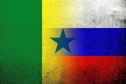 National flag of Russian Federation with The Republic of Senegal National flag. Grunge background