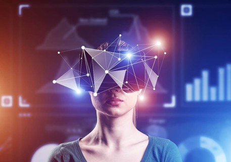 Young attractive woman in VR glasses. Immersion in the virtual world