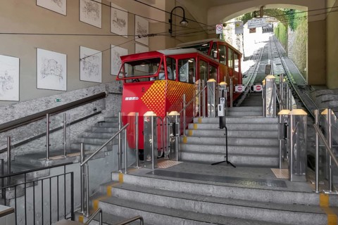 Upper city funicular line in Bergamo (Funicolare Citta Alta). Red funicular connects old Upper City