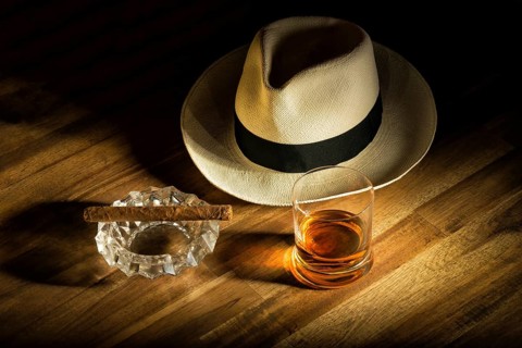 Cigar, rum and Panama hat