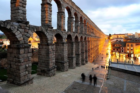 Roman aqueduct in the evening, historic city centre, UNESCO World Heritage Site, Segovia,