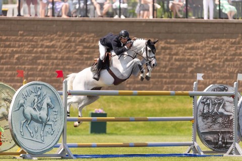 Eugenio Garza Perez of Mexico and riding Contago, compete in the 1.60m Grand Prix during The