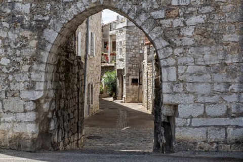Archway in the village of Ruoms in the Ardeche, France